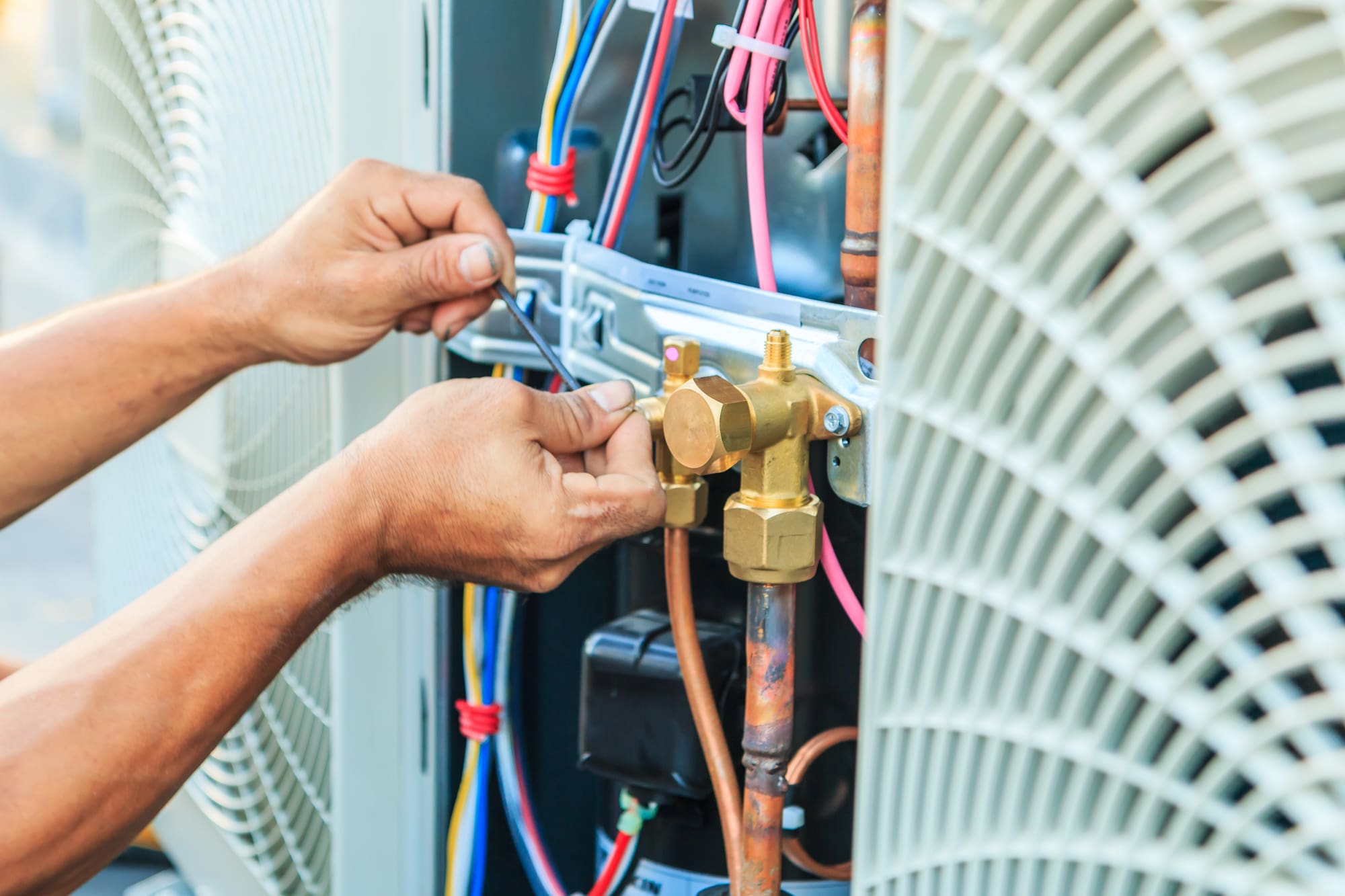 24 hour furnace repair danville service 24 Hour Furnace Repair Danville VA technician working on HVAC system components